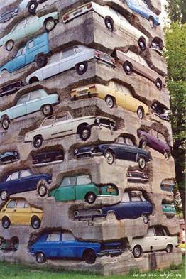 http://cdn.themetapicture.com/pic/images/2014/09/12/cool-art-sculpture-cars-pile.jpg