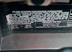 If the specs aren't on any door post, check inside the glove compartment (pictured), under the center console cover or in the owner's manual.